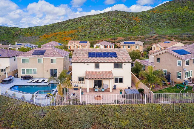 Building Photo - Expansive Five-Bedroom Retreat with Stunning Outdoor Living at Heather Ridge