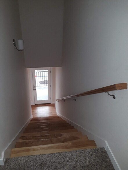 Stairs to the 2 bedroom suites. - 8814 N Edison St