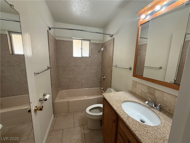 Building Photo - 5643 S Pecos Rd