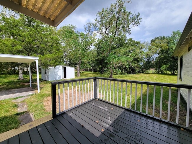 Building Photo - REMODELED 4 BEDROOM 2 BATH LEASE HOME IN A...
