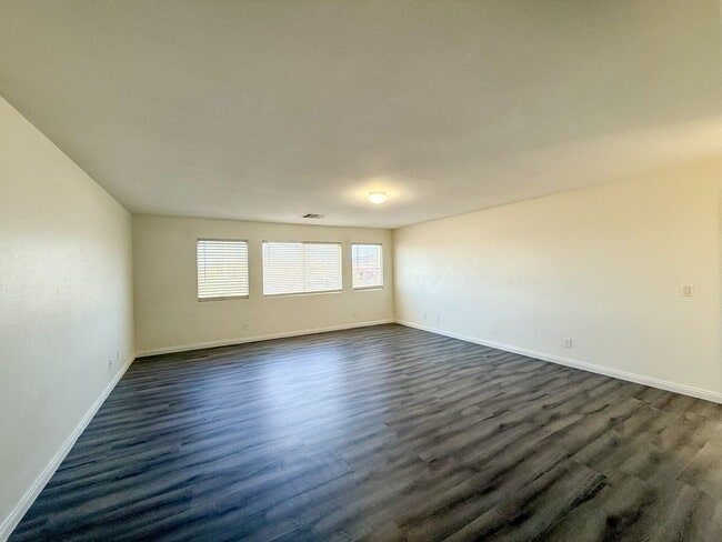 Building Photo - SPACIOUS HOME IN GATED COMMUNITY WITH POOL, RV PARKING & 4-CAR GARAGE!