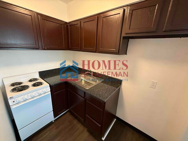 Building Photo - One Bedroom Apartment | Laundry Facility