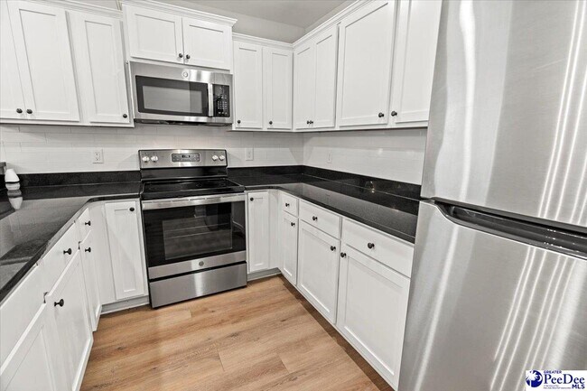 Building Photo - 323 S McQueen St