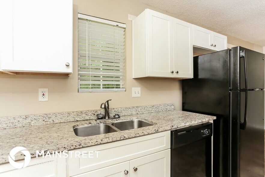 Building Photo - 7220 Woodcreek Way