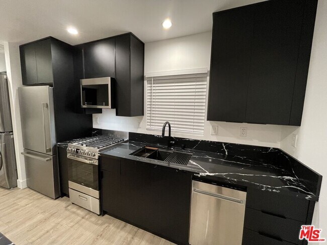 Building Photo - 9504 Gothic Ave