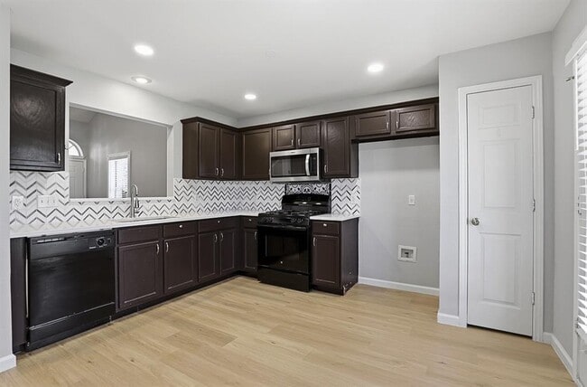 Building Photo - 2410 Charlie Harley Dr