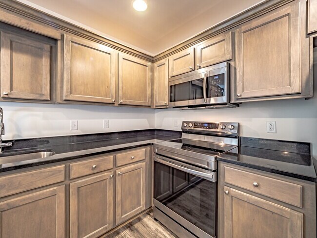 Building Photo - Available now! Has solar panels!