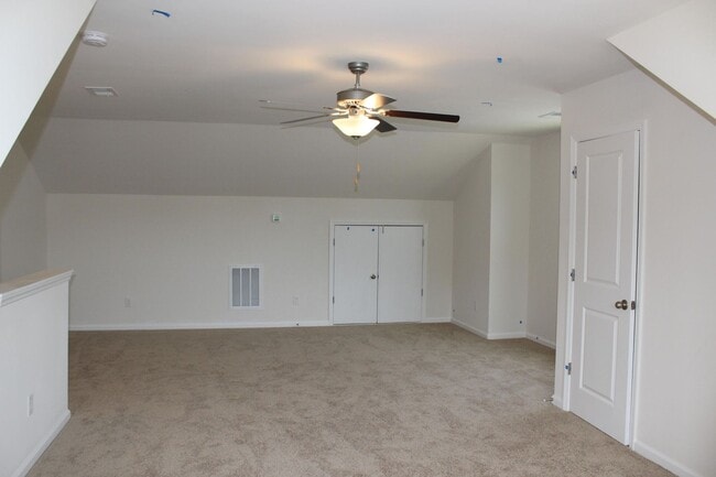 Building Photo - Sun-Filled 3-Story End-Unit Townhome with Fenced Yard, Storage & Resort-Style Pool