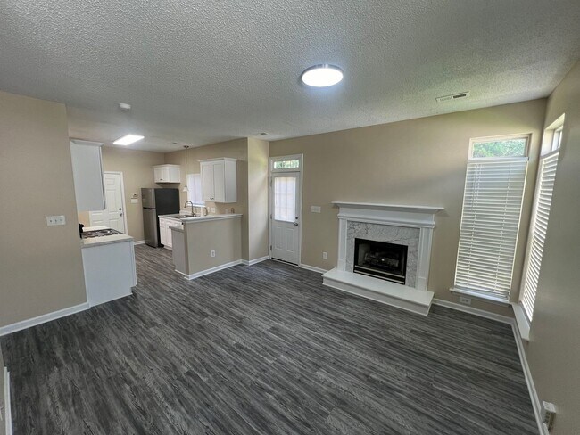 Building Photo - Welcome to Timbertop5127, a well-appointed 4-bedroom, 2.5-bath home in Charlotte, NC.