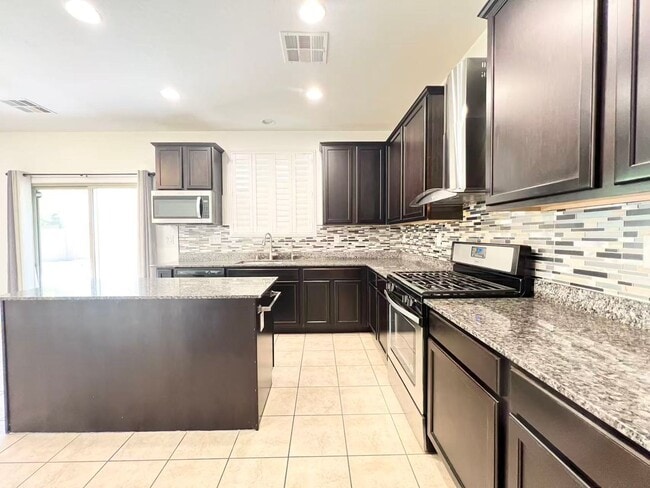 Building Photo - Well-maintained 4-bedroom, 3-bath home in a desirable gated community