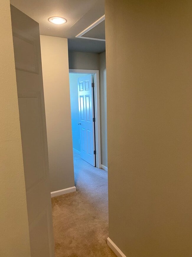 Building Photo - Spacious End Unit Condo