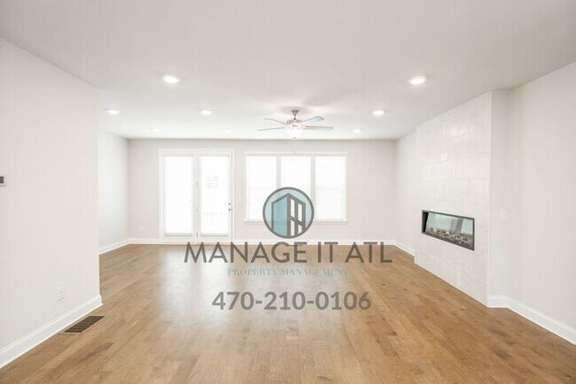 Building Photo - Elegant 4 Bedroom Townhome in Prime Location near HWY 285 in Doraville