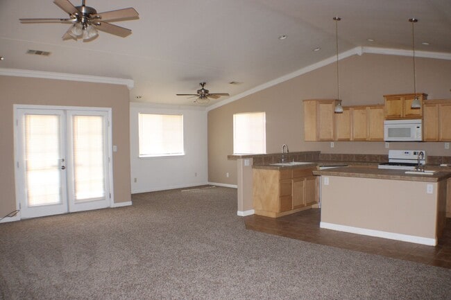 Building Photo - Charming 3-Bedroom Home with Fireplace, Spacious Backyard & Attached Garage in California City!