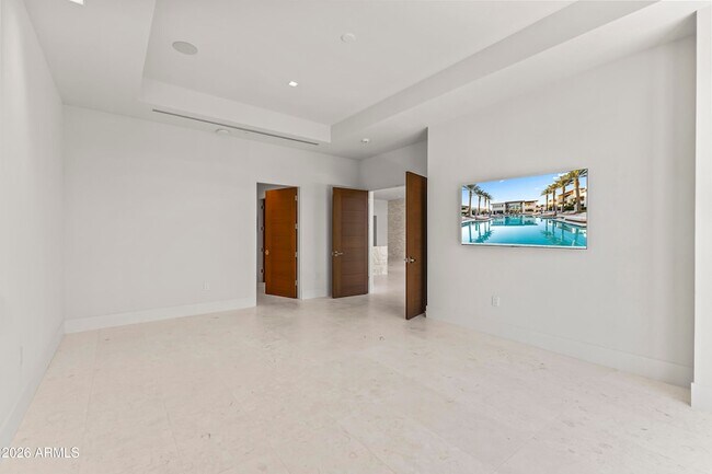 Building Photo - 6587 N Palmeraie Blvd