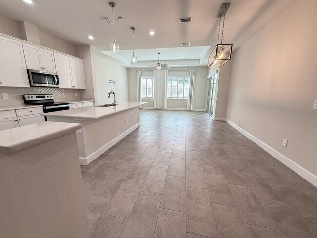 Building Photo - Elegant  2 bed, 2 bath Villa in BridgeWater Landing 55+ community – Maintenance-Free Living at It...