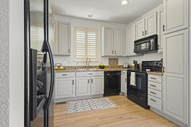 Building Photo - "Spacious 4-Bedroom Townhouse with Granite Finishes & Cozy Fireplace in Parker, CO!"