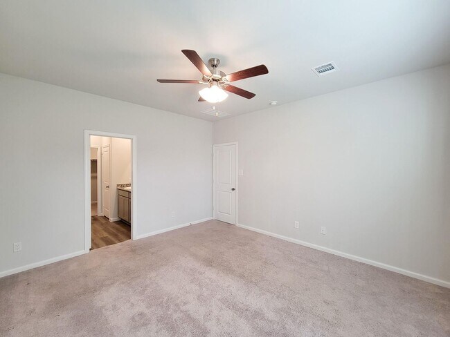 Building Photo - Welcome Home! Your never-lived-in sanctuary awaits your arrival. Have a large household? This 5-b...