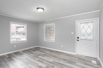 Building Photo - Charming 3 bed/2 bath home with Sunroom and Deck, minutes from Downtown Durham!