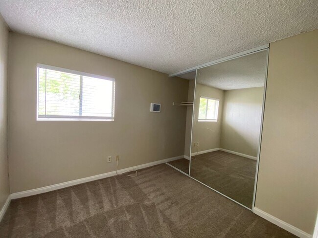 Building Photo - LOCATION & PRIVACY! Spacious 3 br Condo wi...