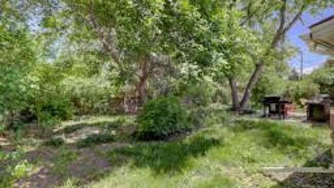 Building Photo - PRE-LEASE 4 BED 2 BATH – Updated Brick Home Near CU & Boulder Creek Path | Available August 2026