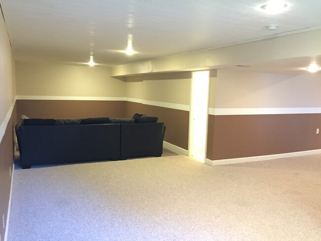 Building Photo - {7301} Quiet Cul-de-sac + Three Car Garage + Updated Kitchen + Finished Basement + Bedroom Level ...