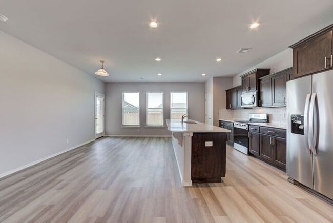 Building Photo - Need More Space? This 4/2.5/2 Has It!