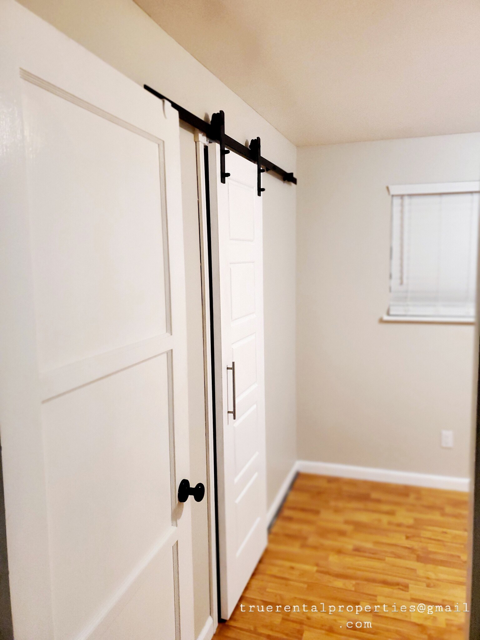 Barndoor-Style Bedroom 1 - 3343 Ward Ave