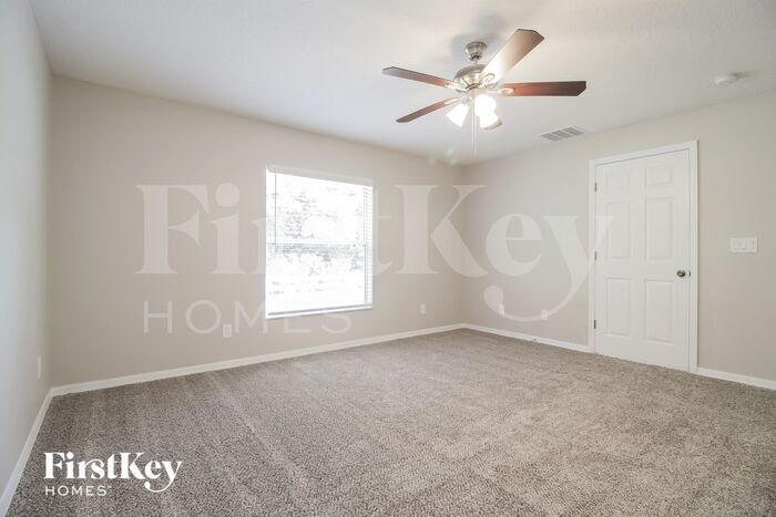 Building Photo - 5771 Cinnamon Fern Blvd