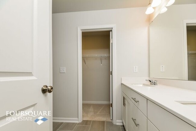 Building Photo - Modern 3-Story Townhome with First-Level Bedroom, Open Floor Plan & Community Pool – Prime RTP Lo...