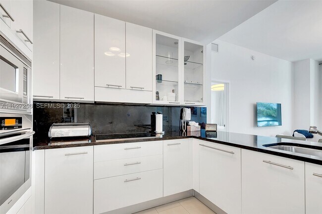 Building Photo - 6799 Collins Ave