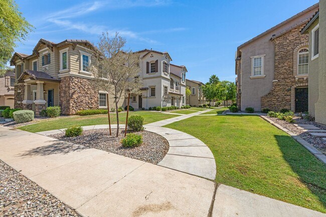 Building Photo - Modern Tri-Level Townhome in Copper Leaf C...