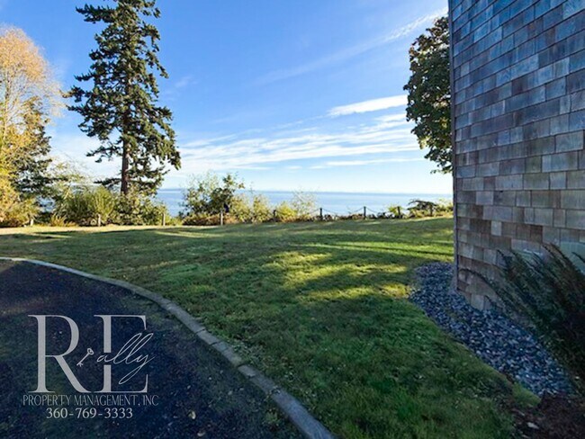 Building Photo - Waterfront Rustic Retreat with Vaulted Ceilings, Picture Windows & Lofted Nook