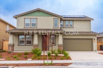 Building Photo - Charming 4-Bed, 3-Bath Home in Lathrop’s T...