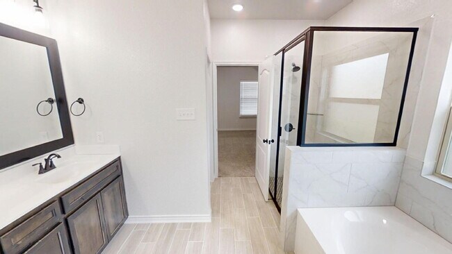 Building Photo - Welcome home to this beautifully designed 4-bedroom, 2.5-bathroom gem!