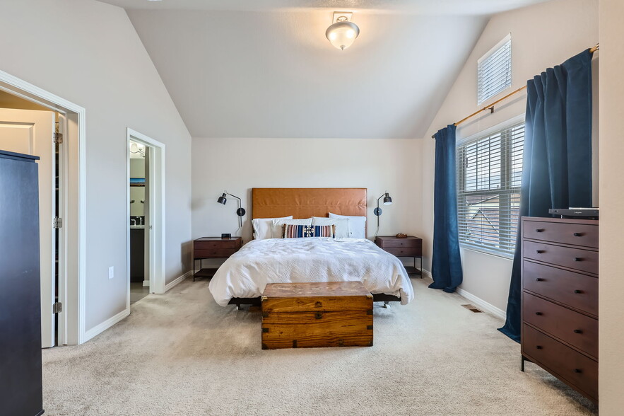 Primary Bedroom with vaulted ceilings - 1854 Jules Ln