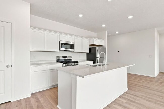Building Photo - Modern 4-Bedroom Home with a 3-Car Garage & Covered Patio