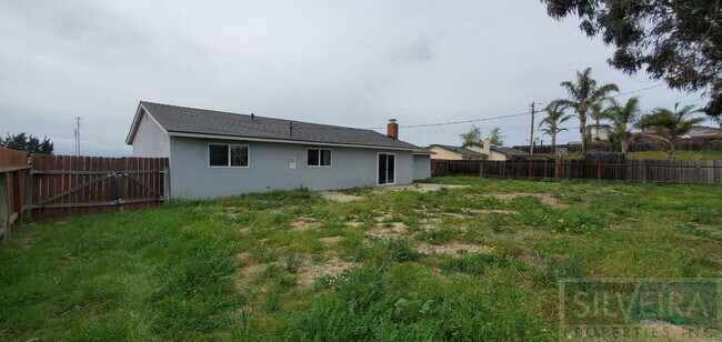 Building Photo - Four bedroom house available!