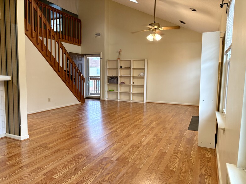 View of the great room from furthest corner from the door - 208 Quarter Trl