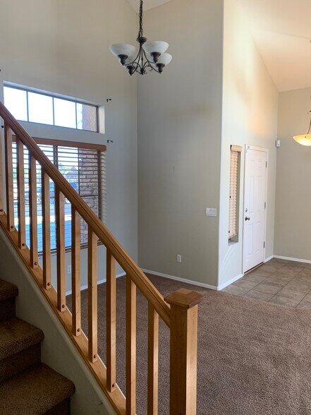 Spacious 4-bedroom, 2-bath home with soaring ceilings, gourmet kitchen, and a heated self-cleaning p - 16426 N 152nd Ln