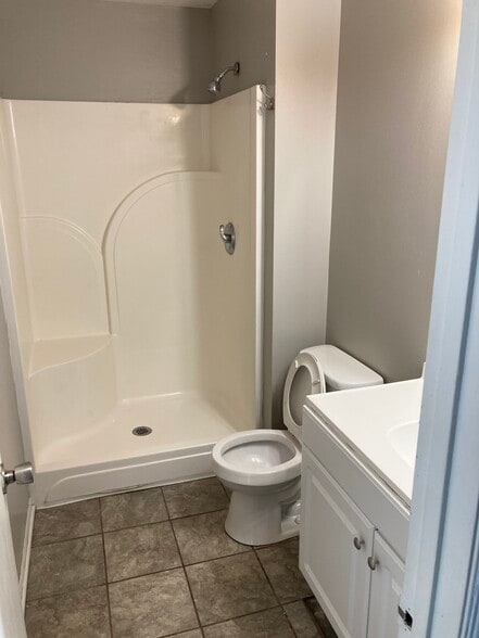 Downstairs bathroom with a shower - 1080 Fairlane Ct