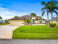 Building Photo - 5777 NW Eskimo Cir