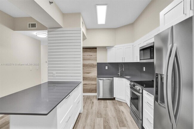 Building Photo - 8816 Collins Ave