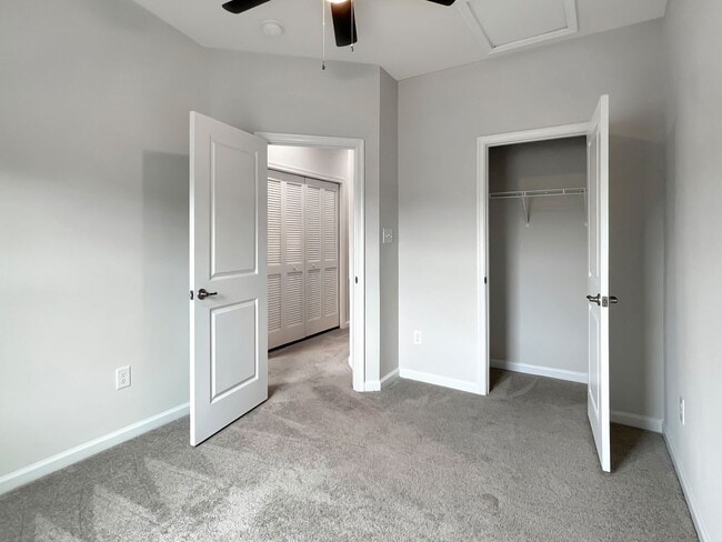 Building Photo - Move-In Ready Townhome with Finished Basem...