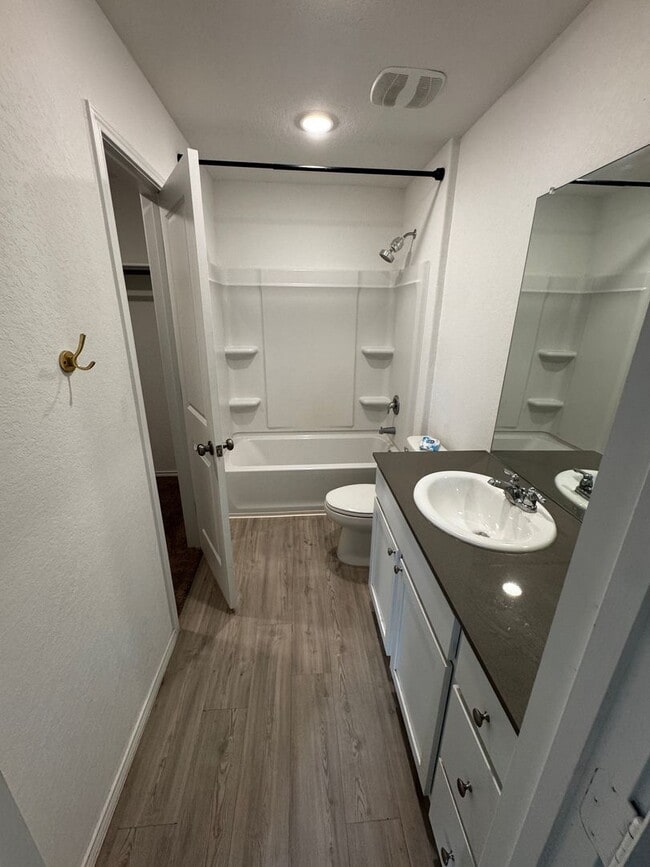 Building Photo - Modern 2024 New-Build with Open-Concept Living and Private Primary Suite in Waterwheel Subdivision