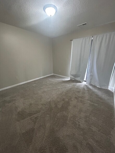 05_Bedroom 1 - 4004 Village Creek Dr