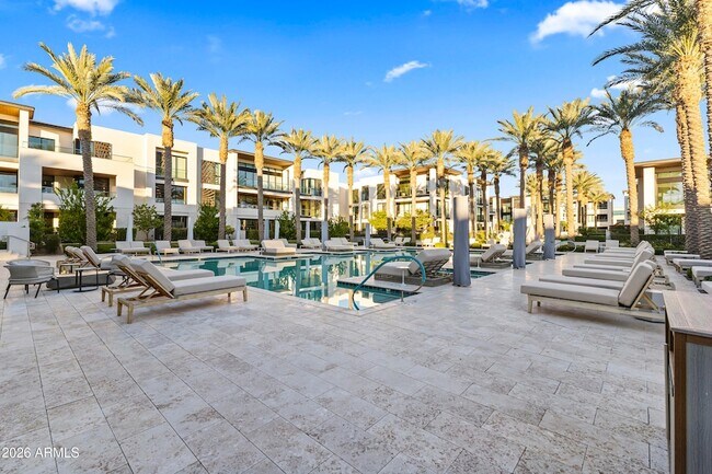 Building Photo - 6587 N Palmeraie Blvd