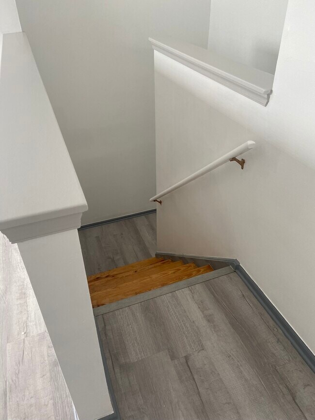 2nd floor master bedroom stairwell entrance - 114 Front St