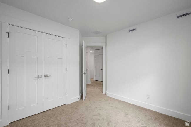 Building Photo - 3-bedroom, 2.5-bath townhome offering modern living in an unbeatable location.