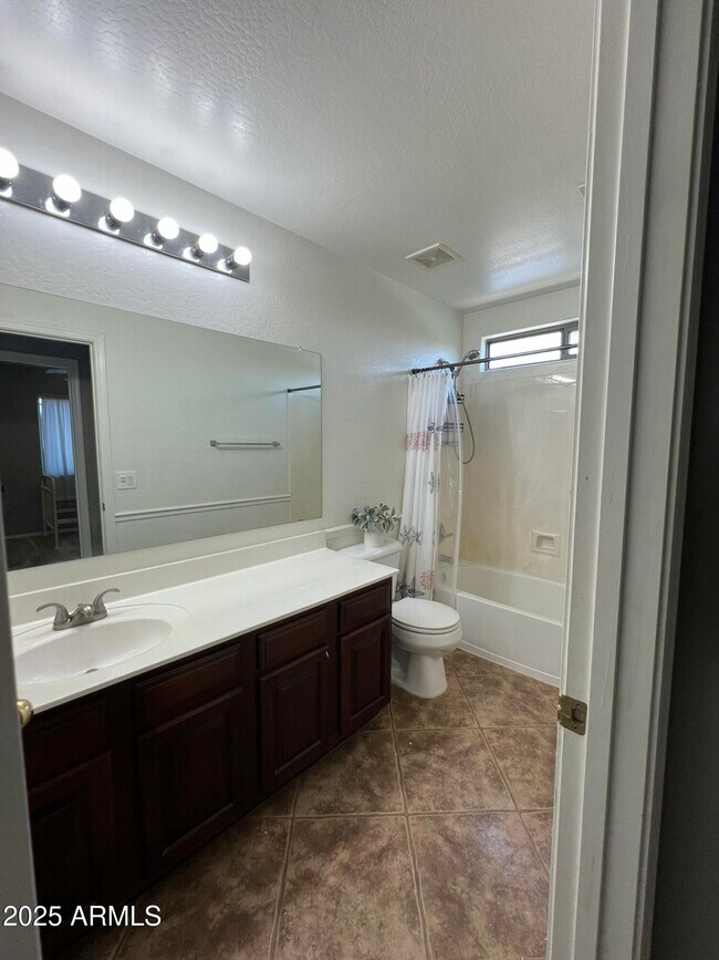 Building Photo - 14711 W Riviera Dr