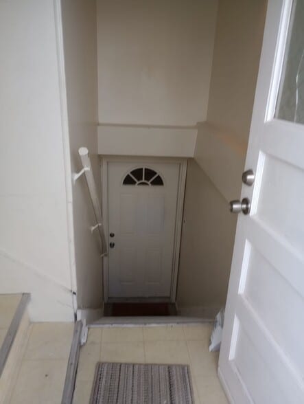 Room view with door frame - 5655 W Ellsworth Ave